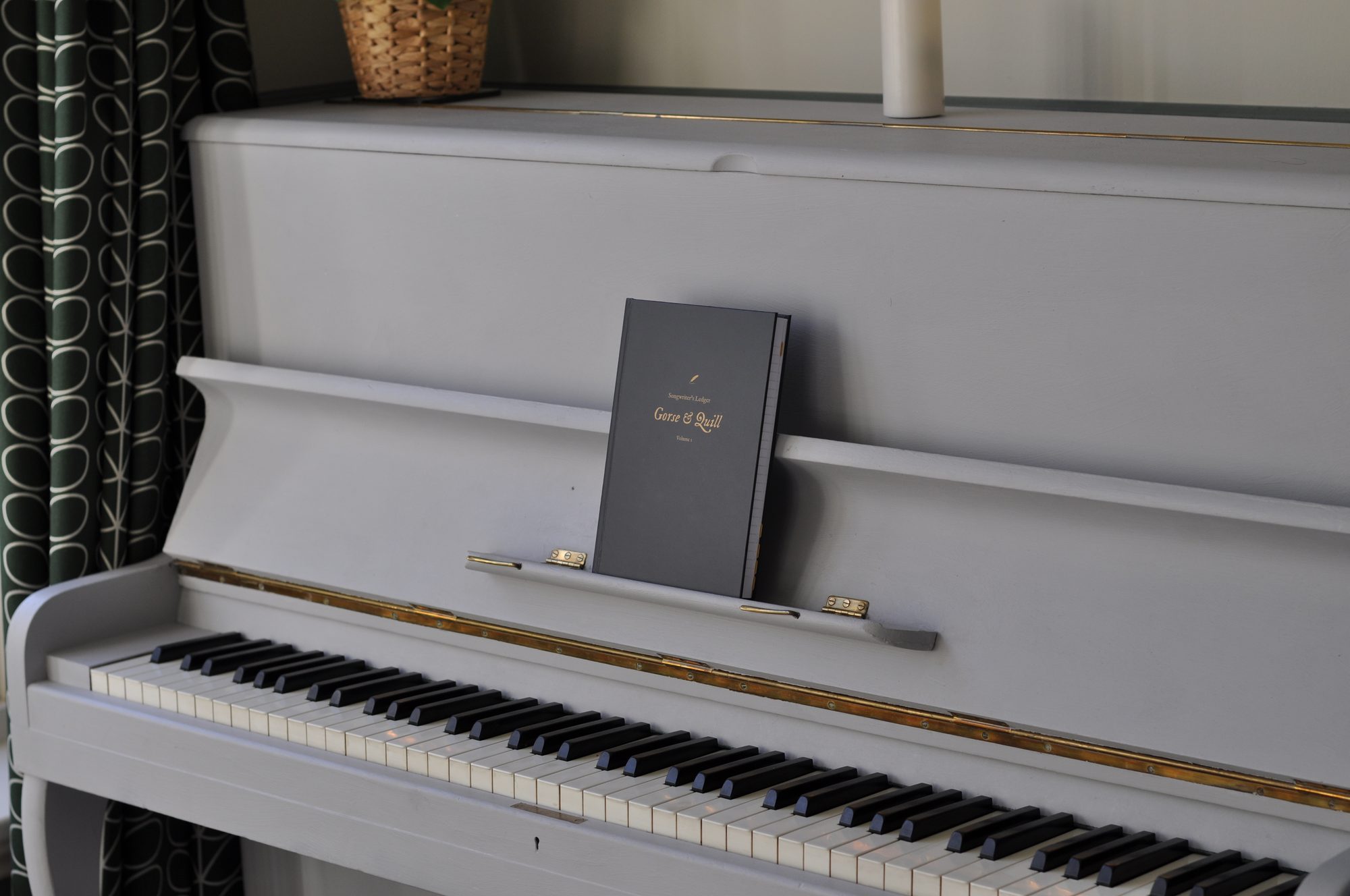 The Songwriter's Ledger, open on a desk
